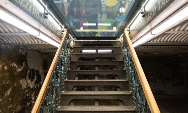 This is the staircase visible through the glass floor in the Adelaide Arcade thoroughfare